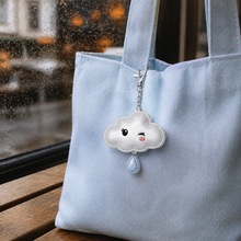 Winking Cloud Reflector Charm